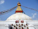 Kathmandu Boudhanath 13-2 Boudhanath Stupa Entrance Steps Are Blocked By Flowers 
